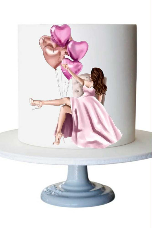 Brunette sitting with balloons - Edible Impressions